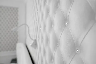 a close up of a white shirt with buttons at SLOAPART Apartments in Rogaška Slatina