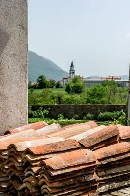 a pile of red bricks sitting next to a building at Majerija in Vipava