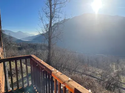 a view of the mountains from the balcony of a house at Nadiza Hilltop Retreat in Breginj