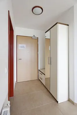 an empty room with a closet and a door at Apartma Moravske Toplice in Moravske Toplice