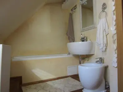 a bathroom with a sink and a toilet at A precious apartment in Ljubljana in Ljubljana
