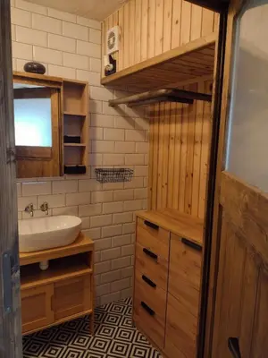 a bathroom with a sink and a toilet and a mirror at Holiday apartement Sentjur in Šentjur