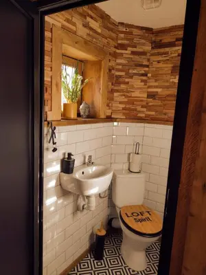a bathroom with a toilet and a sink at Holiday apartement Sentjur in Šentjur