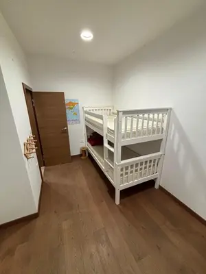 a room with a bunk bed and a staircase at Apartma Vila De Casa in Ribnica