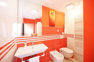a bathroom with a sink and a toilet at GOLOB Apartment Kranjska Gora in Kranjska Gora