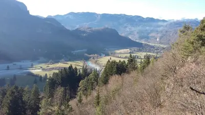 a view of a valley with a river and mountains at Apartment Alpine Lake in Bled