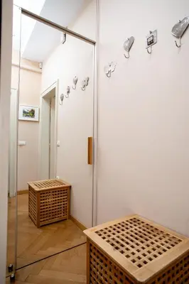 a bathroom with a glass shower and a bench at Skyscraper Amazing Castle & City View Apartment in Ljubljana