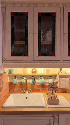a kitchen counter with a sink and some cabinets at Studio Queen Alpine in Cerklje na Gorenjskem