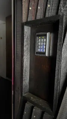 a close up of a door with a remote control at Studio Queen Alpine in Cerklje na Gorenjskem