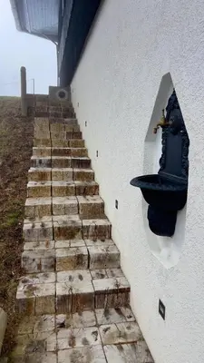 a set of stairs next to a building at Studio Queen Alpine in Cerklje na Gorenjskem