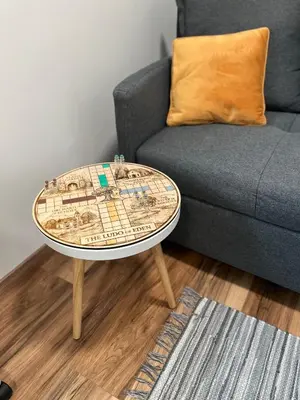 a coffee table in a living room with a couch at House of Eden- Private Family Holiday Home in Terme Catez with FREE Pool Tickets in Čatež ob Savi