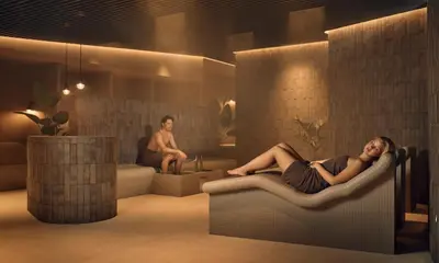 a woman laying in a chair in a bathroom at House of Eden- Private Family Holiday Home in Terme Catez with FREE Pool Tickets in Čatež ob Savi