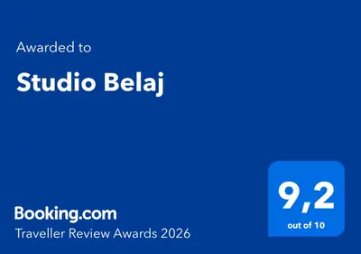 a blue rectangle with the words addicted to subula bellidad at Studio Belaj in Celje