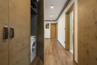a laundry room with a washer and dryer at Dovski Razgled in Dovje