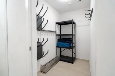 a walk in closet with antlers on the wall at Apartment ALPINE IBEX, Nordic House, Kranjska Gora - Center in Kranjska Gora