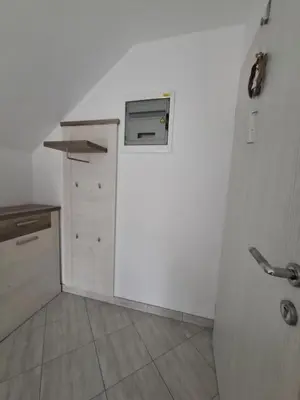 a white kitchen with a sink and a stove at Comfortable 4 room 4 full Family in Tržič