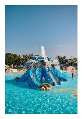 a water slide in a pool at a water park at Apartma Zala in Brežice