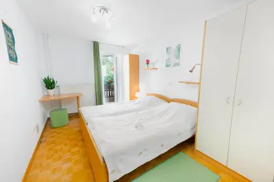 a bedroom with a bed in a room at DREAMLAND BLED Apartments in Bled