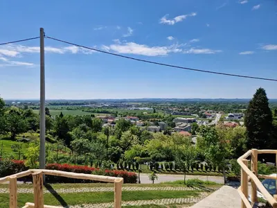 a view of a city from the top of a hill at Izba in Lendava
