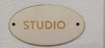 a sign on a wall with the word subo at HIŠA MARGIT, Studio APARTMA in Rateče