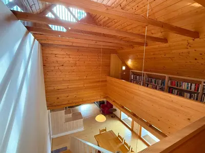 an overhead view of a room with wood paneling at Soča Village in Soča