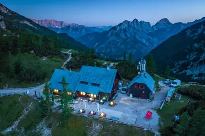 an aerial view of a house in the mountains at Poštarski dom on Vršič in Kranjska Gora