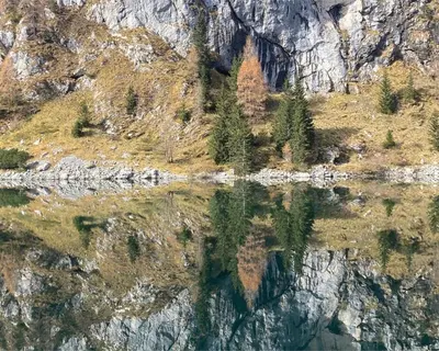 a reflection of a mountain in a body of water at Nomad 27 in Bovec