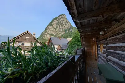 a balcony with a view of a mountain at Rustic House 13 in Bohinj