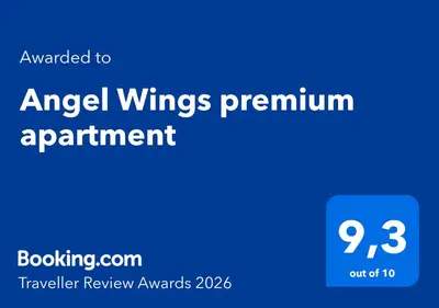 a blue sign with the words angel wingsremnants apartment at Angel Wings premium apartment in Ljubljana