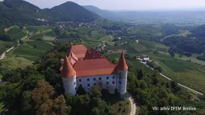 an aerial view of a castle in the mountains at Apartment House Sumrak in Bizeljsko