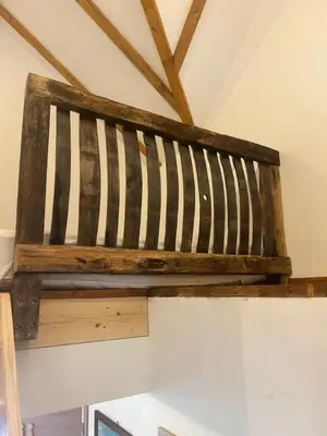 a wooden crate on the ceiling of a room at Ana&Borl House in Gradišča