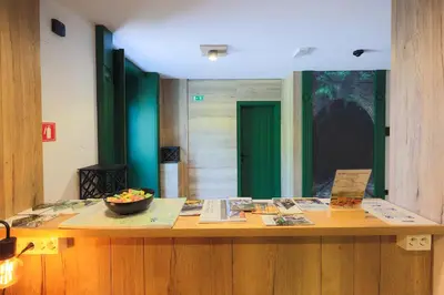 a wooden counter with a bowl of food on it at Vila Savica Bled in Bled