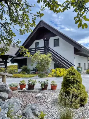 a house with plants in front of it at Bled Veldes in Bled