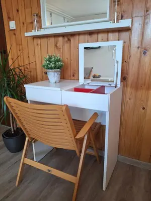 a white desk with a chair and a microwave at Prenočišče Breza in Radovljica