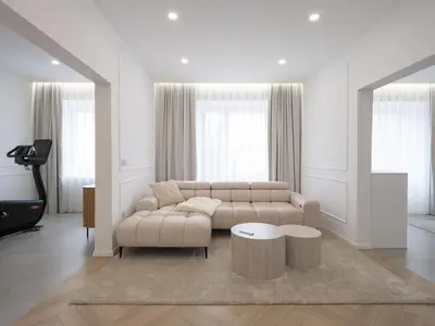 a living room with a couch and a table at Trend Apartment in Ormoz