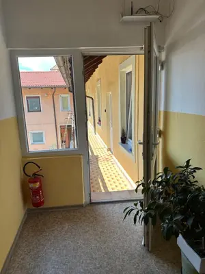a door to a room with an open door to a hallway at Soba Pri Kosu in Slovenska Bistrica