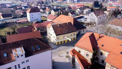 an aerial view of a town with buildings at Soba Pri Kosu in Slovenska Bistrica