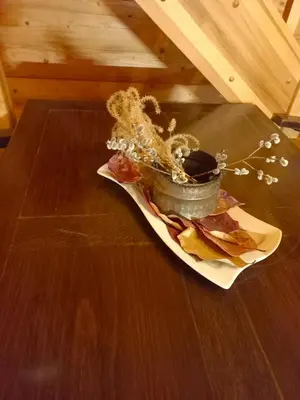 a bowl of dried flowers on a table at Oaza miru in zdravja Goričko in Moravske Toplice