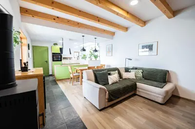 a living room with a couch and a table at Holiday home in Trebnje - Kranjska (Krain) 53751 in Trebnje