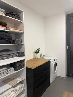 a laundry room with a washer and dryer at Smart & Wellness Villa in Ptuj