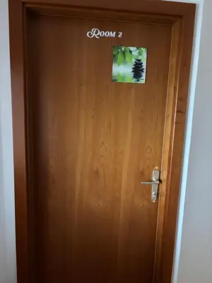 a wooden door with a room sign on it at Trnovo Lunca Apartment in Ljubljana