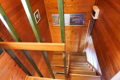 an overhead view of a staircase in a wooden cabin at Chalet Slavko in Bohinjska Bistrica