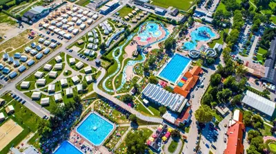 an aerial view of a resort with swimming pools at Family Holiday Home in Terme Čatež in Čatež ob Savi