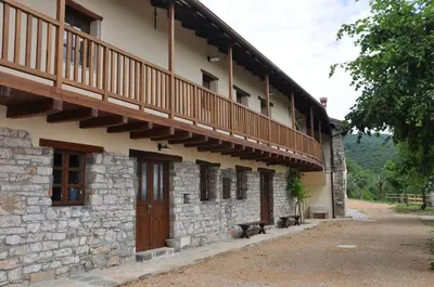 a building with a balcony on the side of it at Pri Bregarju in Podsabotin