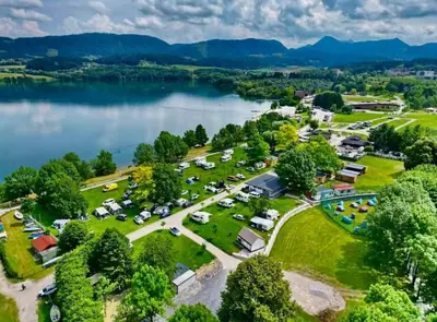 an aerial view of a campground next to a lake at Casa1895, Stylish Old Town Apartment near Beer Fountain in Žalec