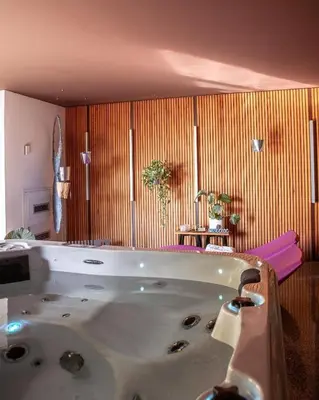 a bathroom with a large bath tub in a room at Peaceful Stay Among the Vines in Vipolže