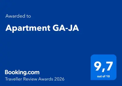 a blue sign with the words appointment ga jaa at Apartment GA-JA in Ljubljana