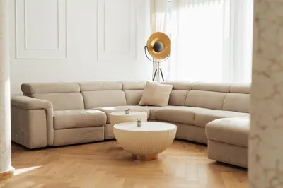 a living room with a couch and a table at Apartma Tyrseva in Maribor