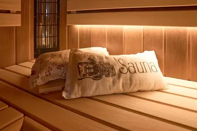 a pillow sitting on a bed in a sauna at Vila Vinita in Sveti Jurij ob Ščavnici