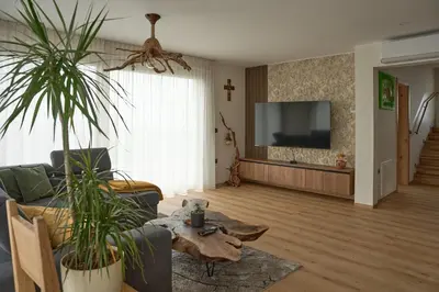 a living room with a couch and a table at Vila Vinita in Sveti Jurij ob Ščavnici